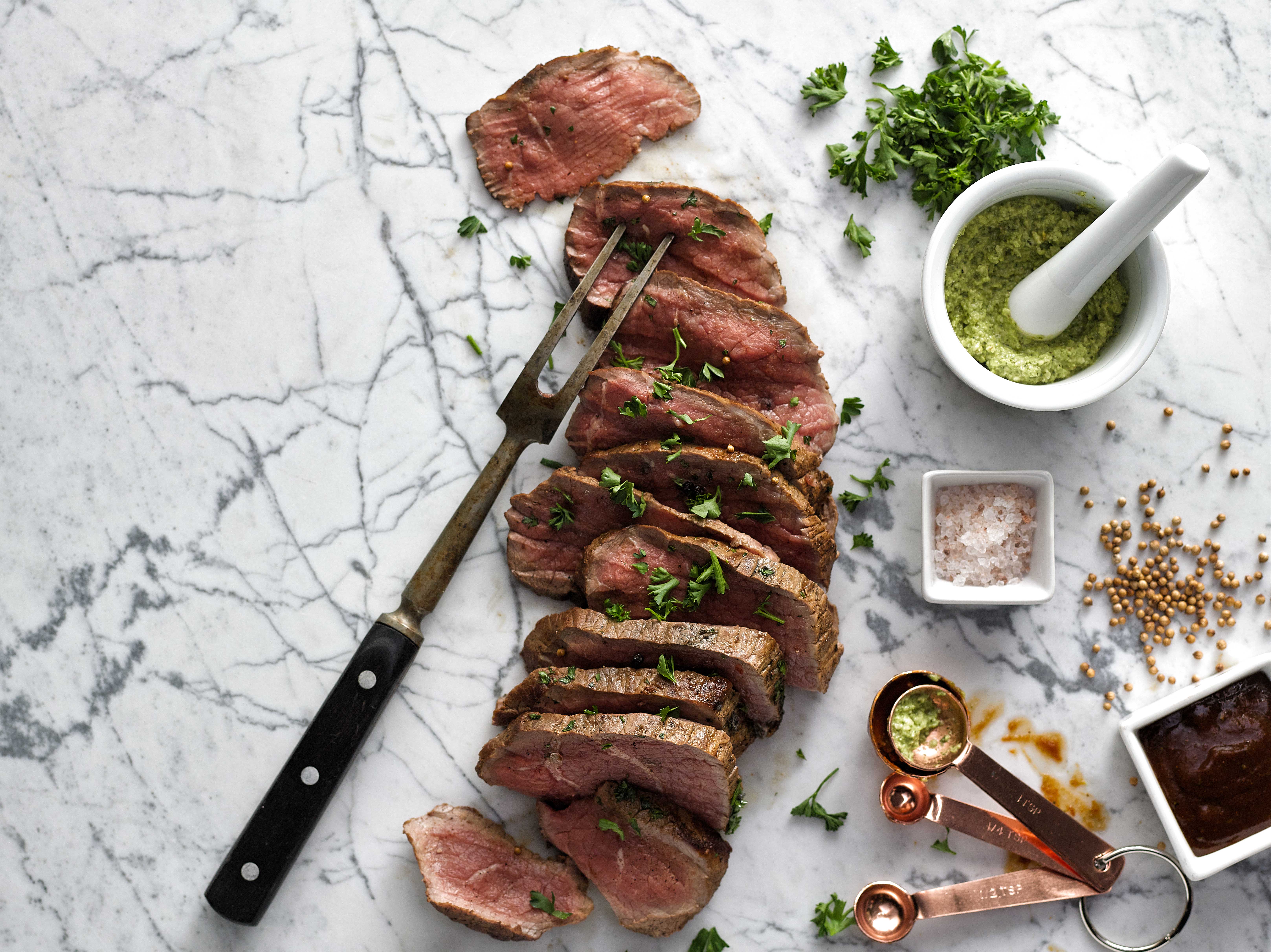 Grilled steak styled photograph from above with ingredients