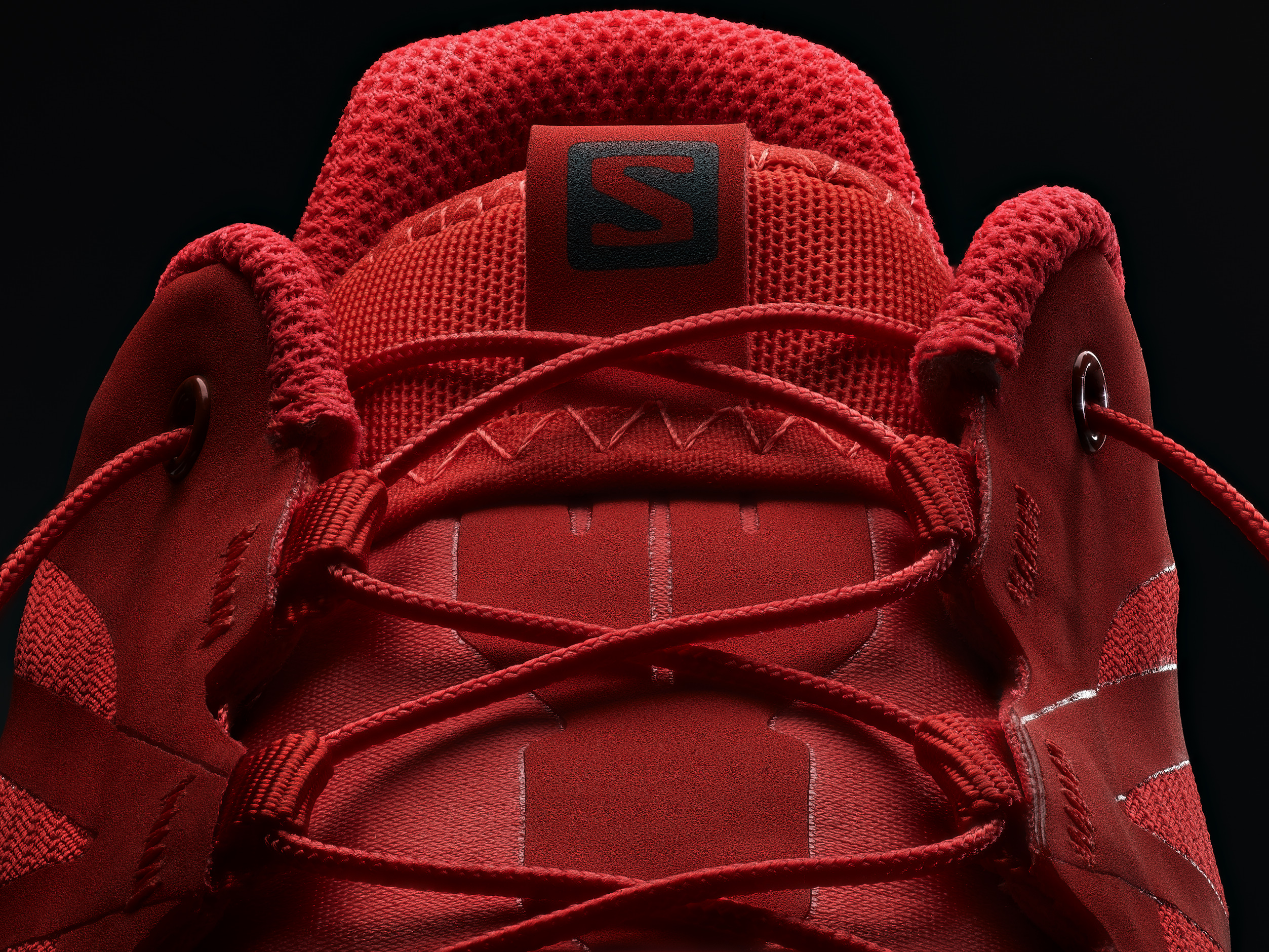 Detailed Photographs of the tongue of a shoe Solomon lab shoe for trail running And branding photography
